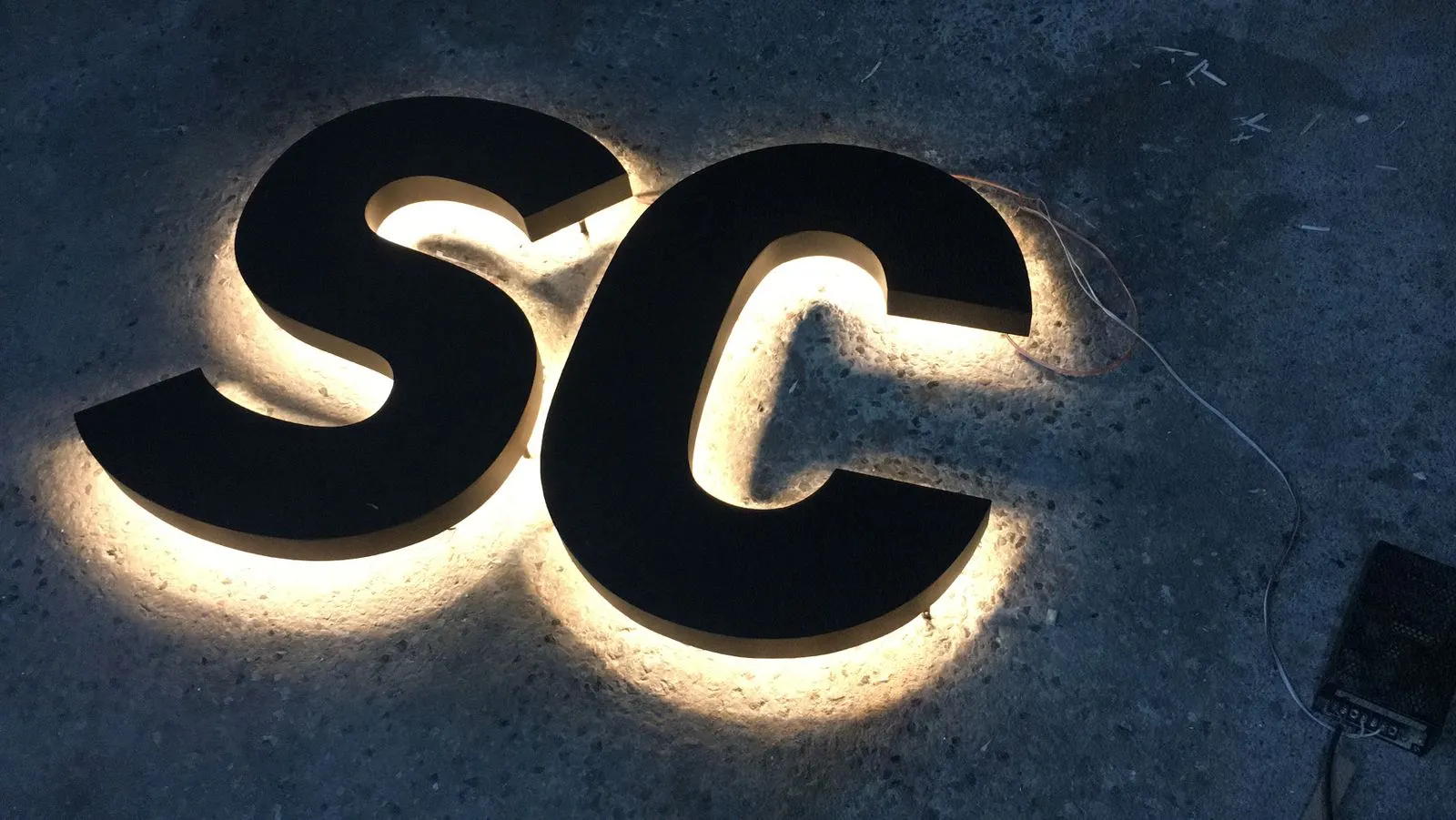Illuminated sign lettering, illustrative stock photography